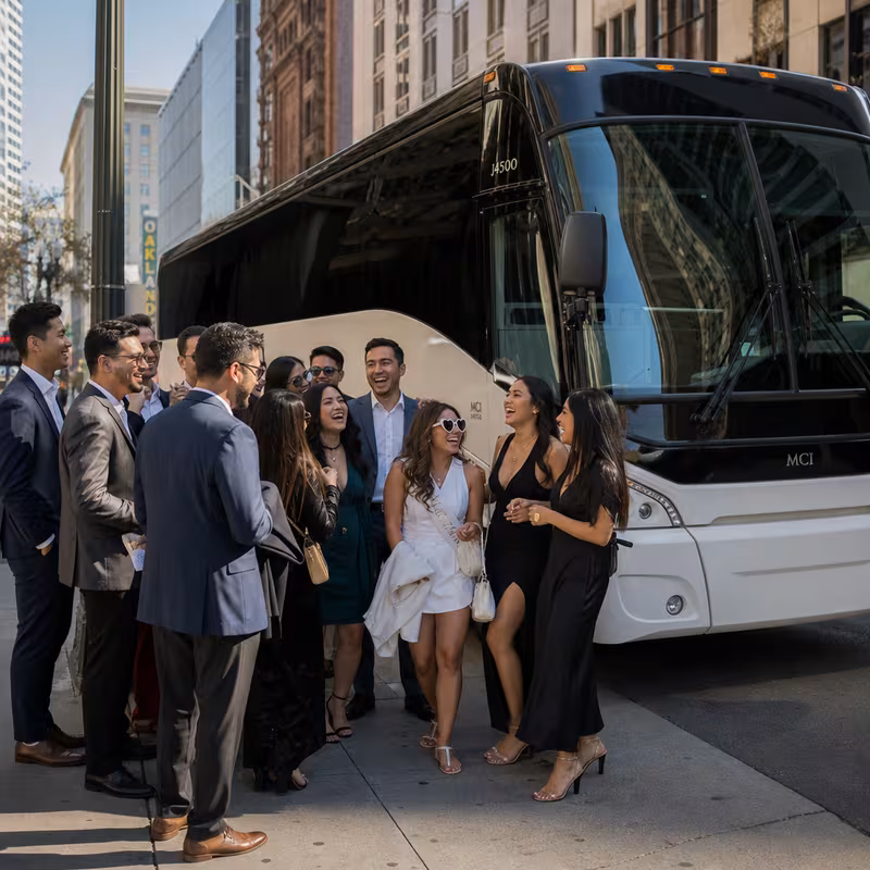 Passengers loading luggage while boarding an Oakland group shuttle