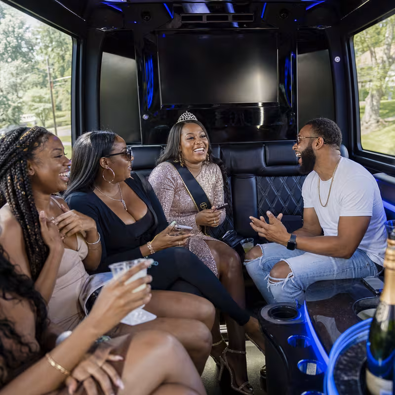 Black Mercedes Sprinter van staged for an Oakland Birthday Transportation group