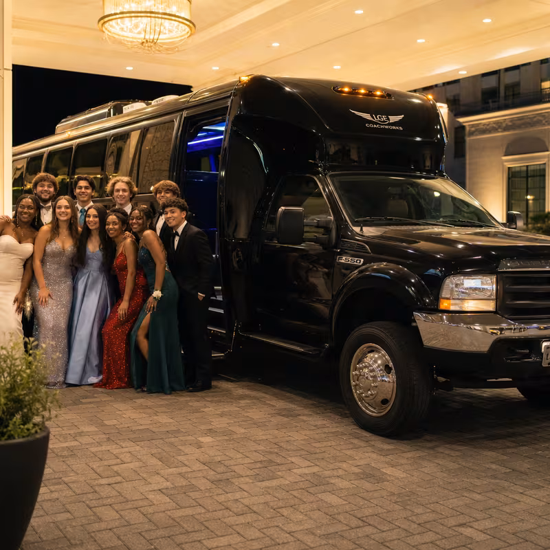 Party bus interior with wraparound leather seating and LED lighting in Oakland