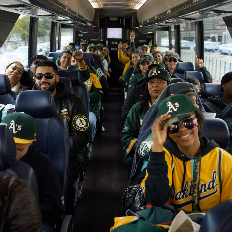 Black Mercedes Sprinter van staged for an Oakland Sporting Event Transportation group